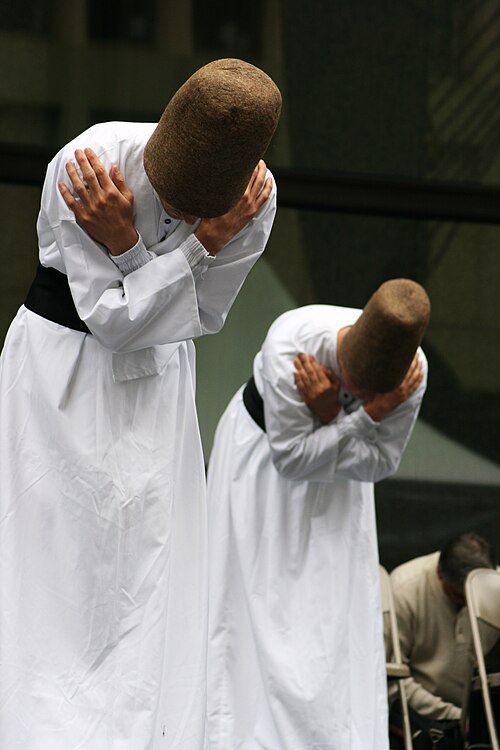 Whirling dervishes of the Mevlevi Order performing the Sema ceremony